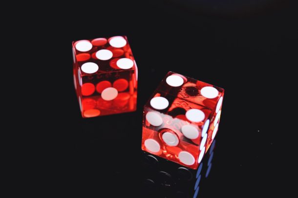 Colorful dice showing nine