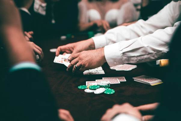 Poker playing on table